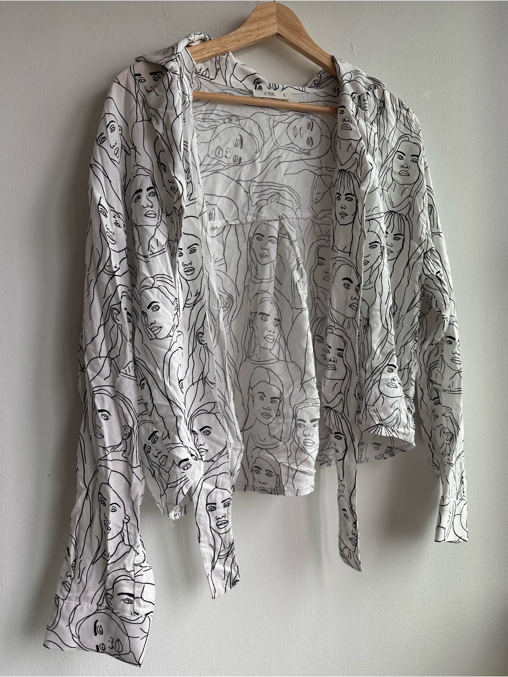 White Lightweight Cardigan with Black Line-Drawn Faces